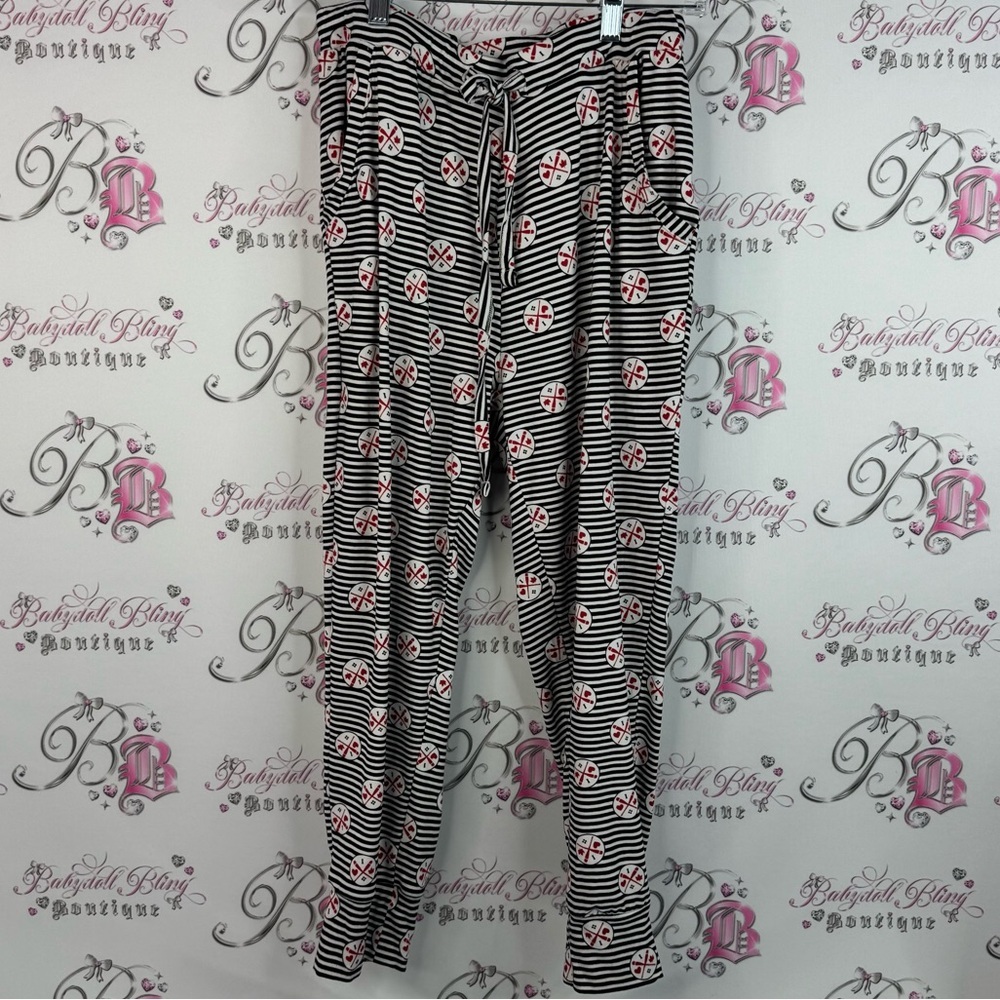 True north pants pj I heart Canada 🇨🇦 Chic Striped Pants with Floral Accents